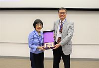 Prof. Fanny CHEUNG (left), Pro-Vice-Chancellor of CUHK, presents a souvenir to Mr. Li Nai-yiu, President of BHKAEC